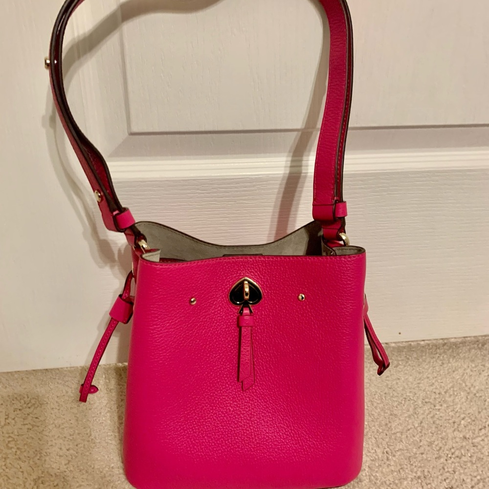 BRAND NEW, never been used Kate Spade marti small bucket bag (bright magenta).